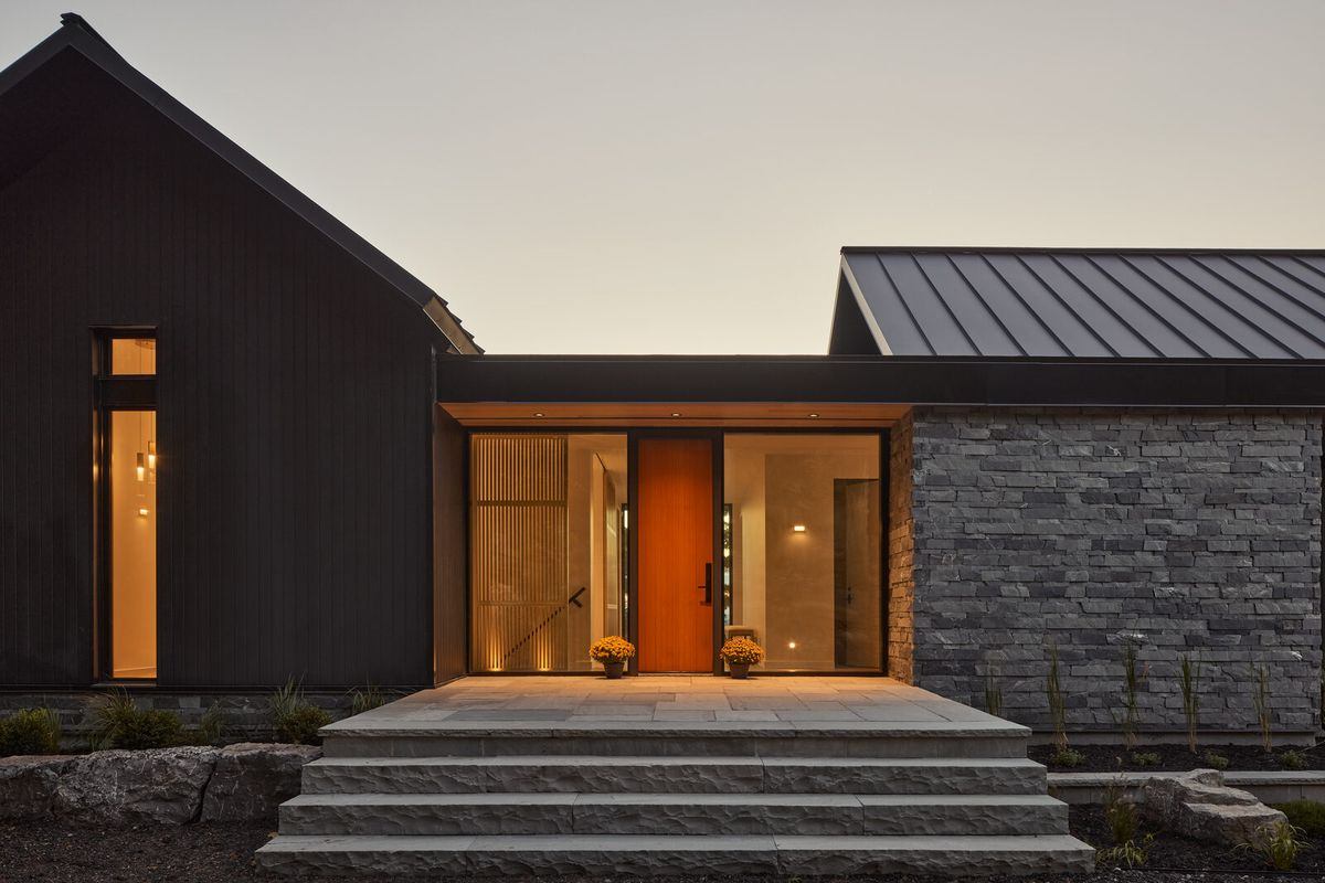 Modern home entrance at dusk